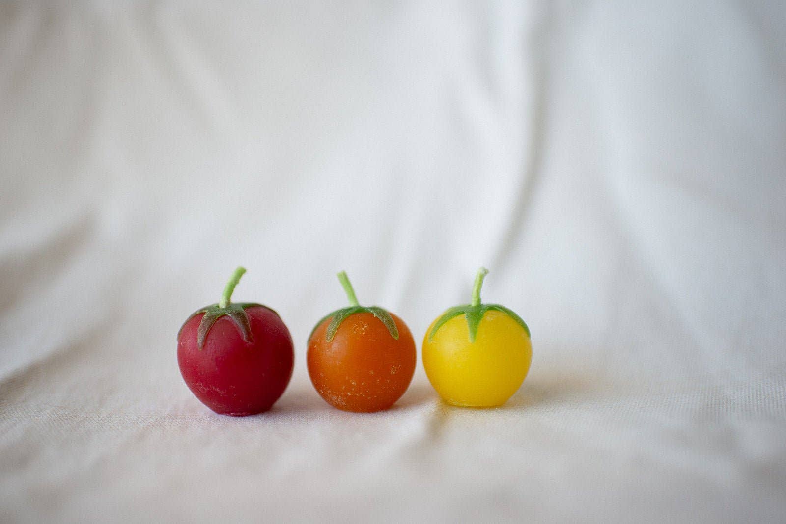 Cherry Tomato Candles! You'll want to eat them, but don't! Cast from real cherry tomatoes!
