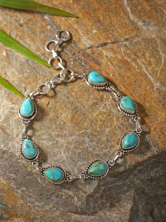 Blue Mohave Turquoise 7-Stone Bracelet - Handcrafted & set in Sterling Silver - Designed for Protection & Inner Peace