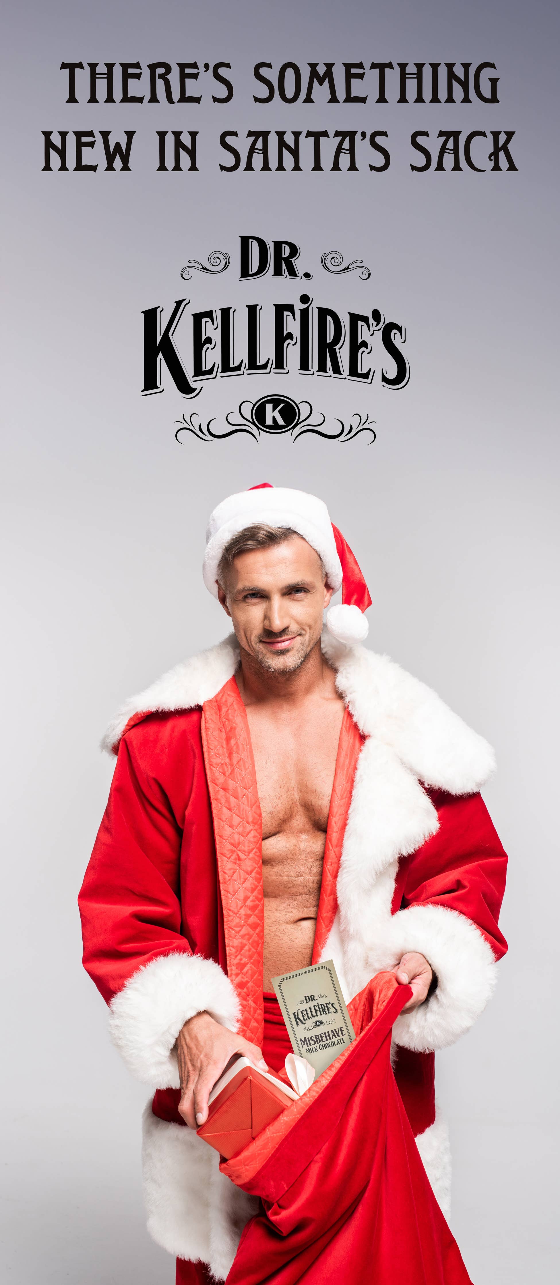 Man in Santa outfit holding a red bag with text about 'Dr. Kellfire's' on a gray background. Sold at Townsend Draft Goods