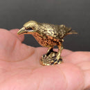 Brass Raven