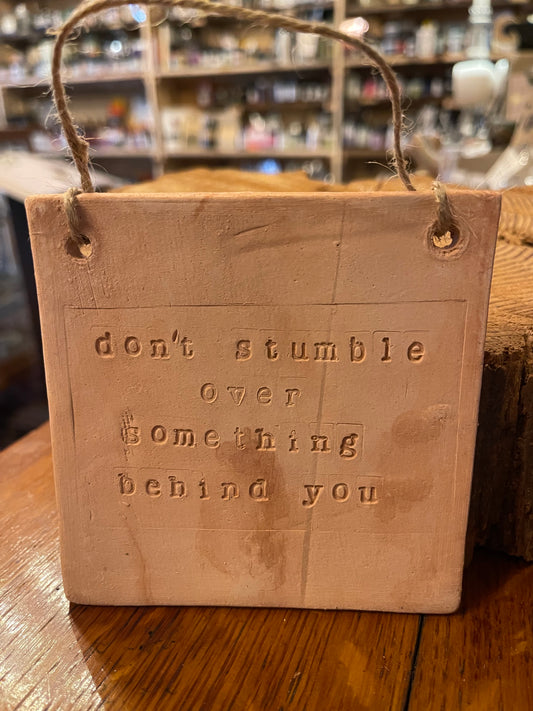 "Don't stumble over something behind you" Wall Hanging Tile