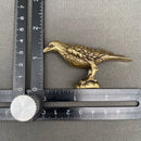 Brass Raven