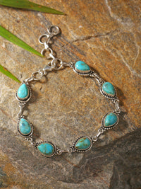 Blue Mohave Turquoise 7-Stone Bracelet - Handcrafted & set in Sterling Silver - Designed for Protection & Inner Peace