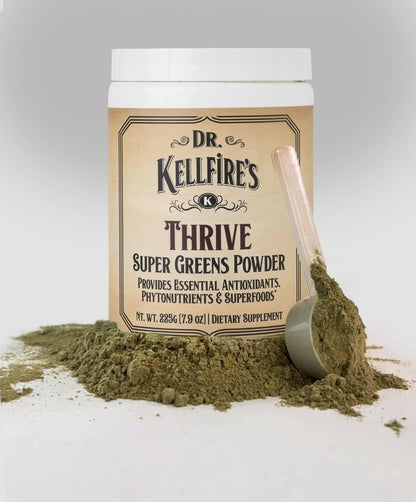 Dr. Kellfire's Thrive Super Greens Powder with a scoop on a light gray background. Sold at Townsend Draft Goods