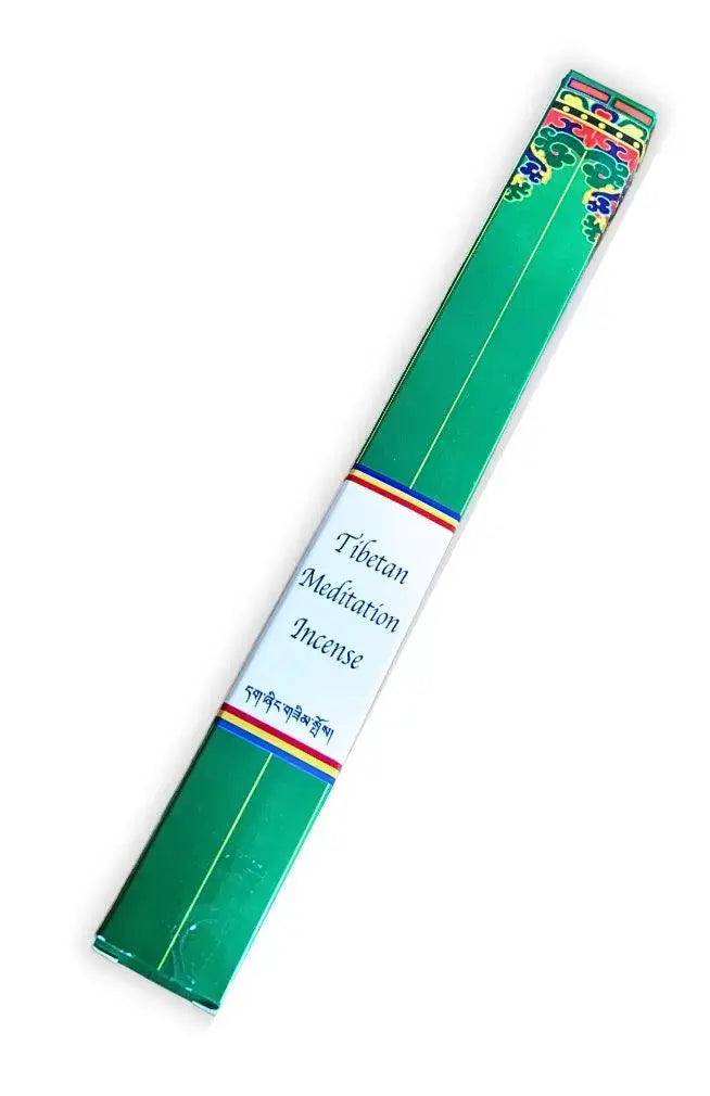 Green packaging of Tibetan Meditation Incense with colorful band on a white background. Sold by Townsend Draft Goods